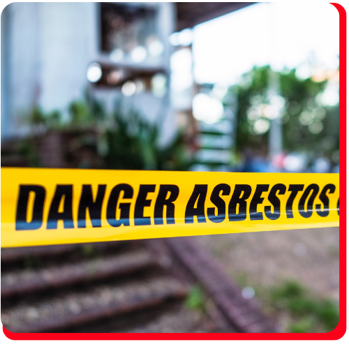 Yellow caution tape marked ‘Danger Asbestos’ cordoning off a commercial property area in Toronto during an asbestos abatement operation.