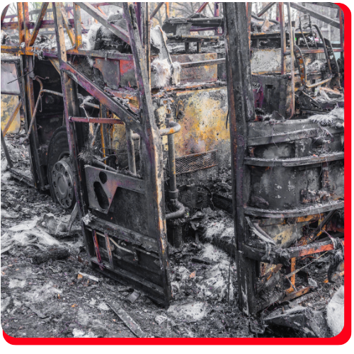 Charred remains of a commercial vehicle after a severe fire, showing extensive structural damage and soot—ideal for showcasing commercial fire cleanup and restoration services. Charred remains of a commercial vehicle after a severe fire, showing extensive structural damage and soot—ideal for showcasing commercial fire cleanup and restoration services.