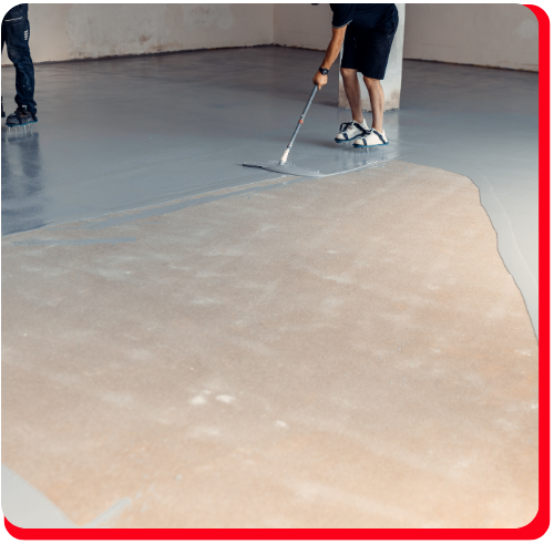 Technicians applying a protective coating on a concrete floor as part of post-disaster contents cleaning and restoration work in Toronto, following fire, smoke, or water damage.