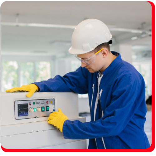 Restoration technician in safety gear operating specialized cleaning equipment—demonstrating contents cleaning and restoration services in Toronto for smoke, fire, or water-damaged commercial items.