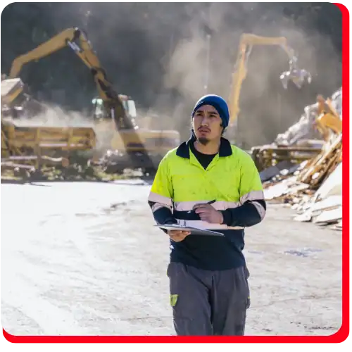 Impact Restore fire damage restoration specialist inspecting a damaged commercial property in Canada